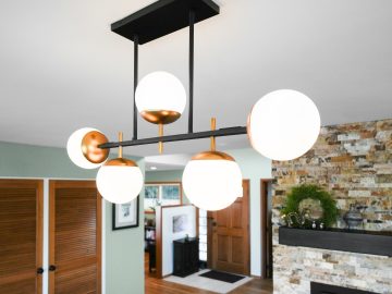 Modern luxury kitchen remodel in Corvallis, Oregon featuring modern luxury light fixture