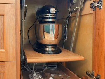 Modern luxury kitchen remodel in Corvallis, Oregon featuring pullout mixer stand
