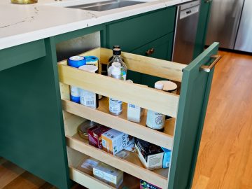 Modern luxury kitchen remodel in Corvallis, Oregon featuring pullout storage solutions