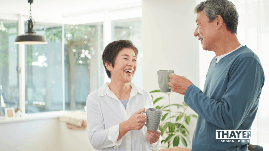 Older couple enjoying coffee together in their home