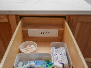 Hall bathroom drawer with outlet in aging-in-place remodel
