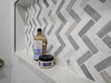 Primary bathroom shower niche in aging-in-place remodel