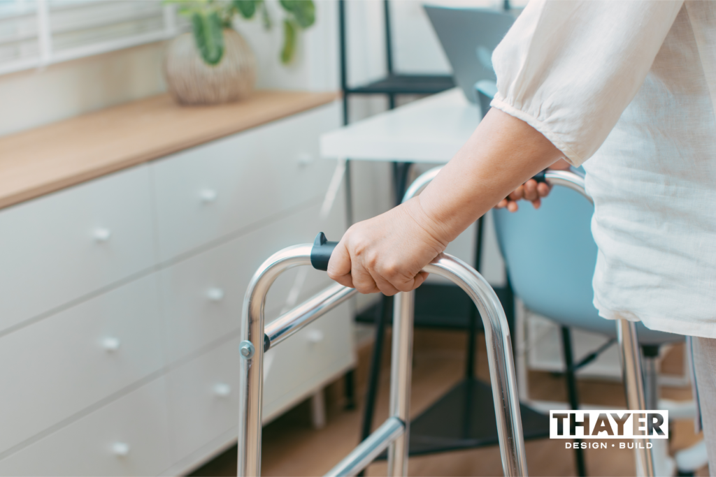 woman in walker in a house that needs to be remodeled