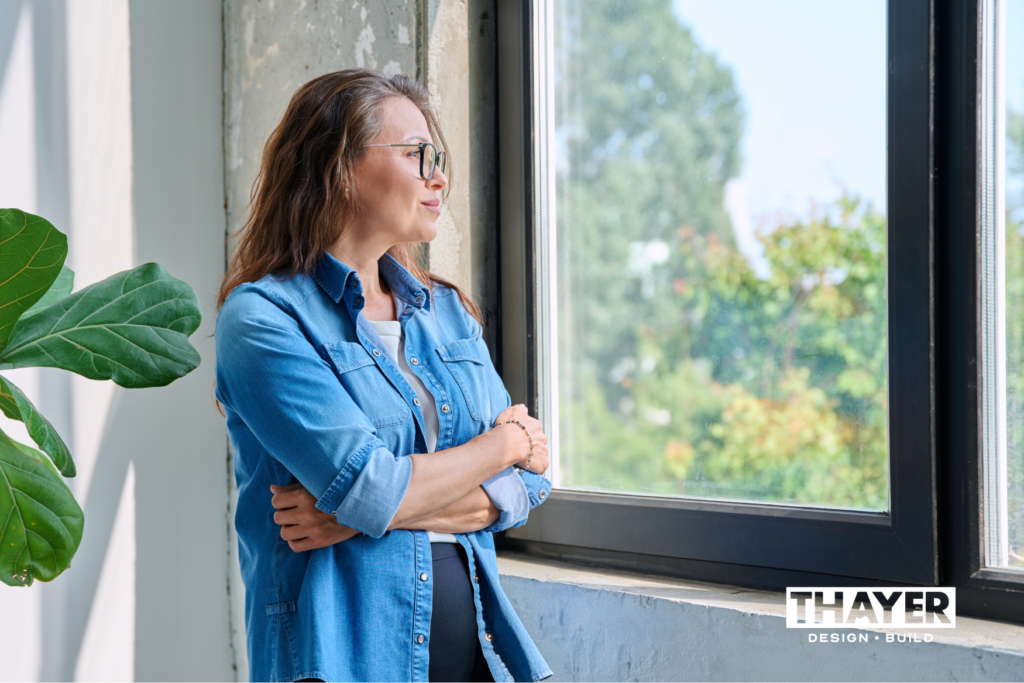 Woman satisfied with her remodeled home